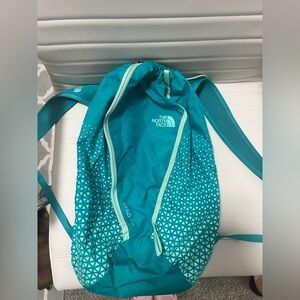 The North Face blue green backpack